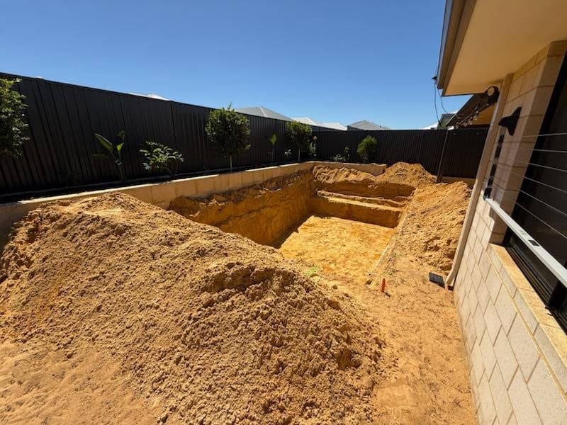 Excavated pool hole ready for builder
